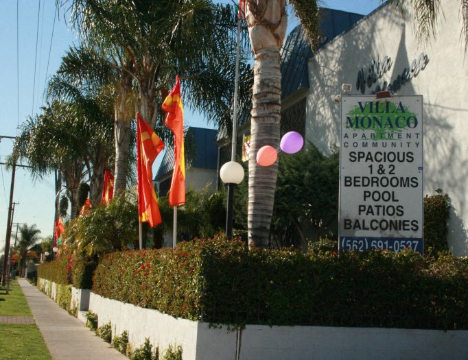 a sign for a restaurant in front of a building